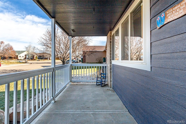 view of patio featuring a porch