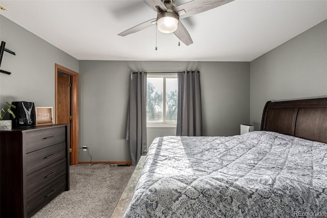 bedroom with ceiling fan and light colored carpet