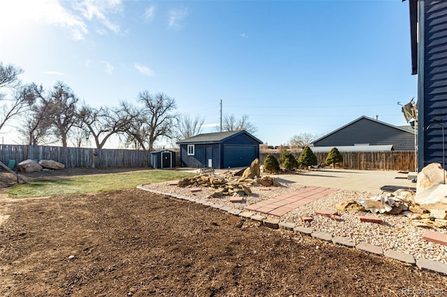 view of yard featuring a patio area and an outbuilding