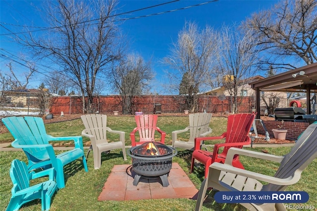 view of patio / terrace with an outdoor fire pit