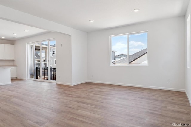 8339 Snake River St, Littleton, CO 80125 - unfurnished room with light wood finished floors and recessed lighting