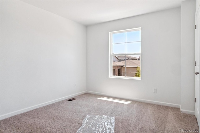 8339 Snake River St, Littleton, CO 80125 - carpeted empty room with baseboards
