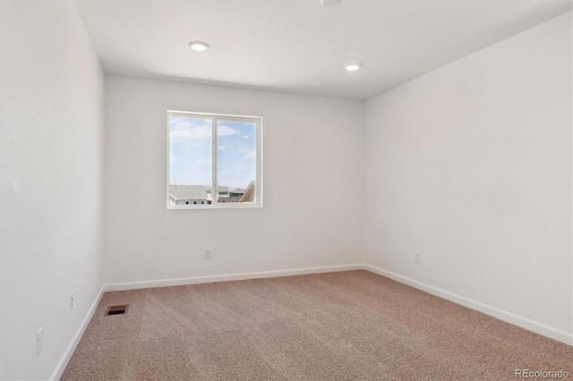 8339 Snake River St, Littleton, CO 80125 - unfurnished room featuring carpet floors and recessed lighting