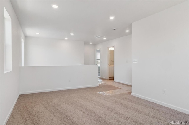 8339 Snake River St, Littleton, CO 80125 - empty room featuring recessed lighting and light carpet