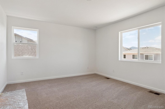 8339 Snake River St, Littleton, CO 80125 - carpeted spare room with baseboards