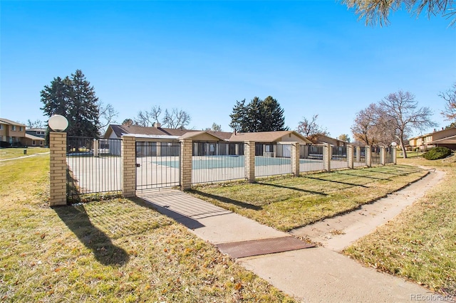 ranch-style home with a front yard