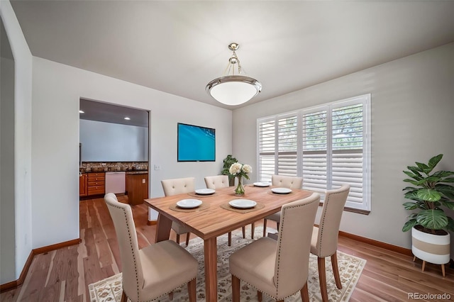 5416 S Hannibal Ct, Centennial, CO 80015 - dining space with baseboards and light wood-style floors
