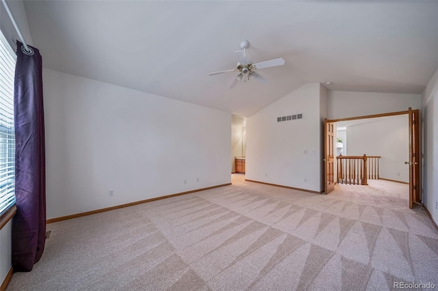 5416 S Hannibal Ct, Centennial, CO 80015 - spare room featuring carpet floors, a ceiling fan, vaulted ceiling, and plenty of natural light