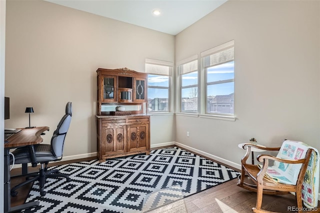 office area featuring wood finished floors and baseboards