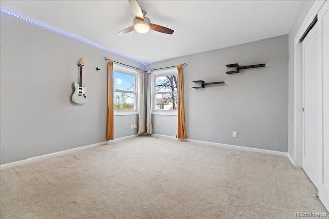 5310 S Flanders Way, Centennial, CO 80015 - carpeted empty room with baseboards and a ceiling fan