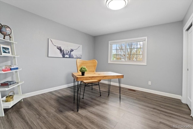 5310 S Flanders Way, Centennial, CO 80015 - home office with baseboards, wood finished floors, and visible vents