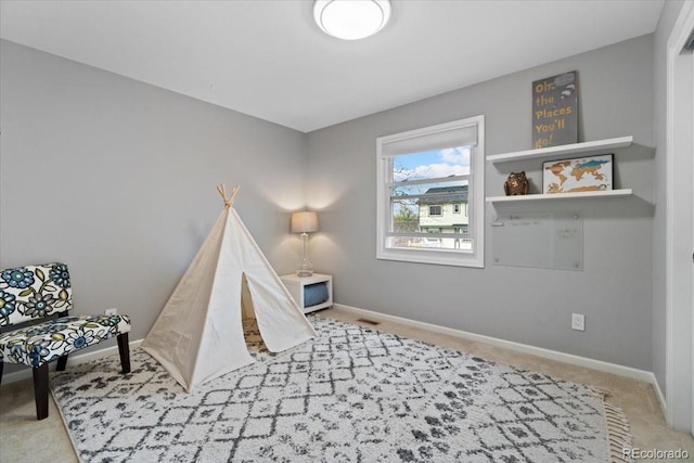 5310 S Flanders Way, Centennial, CO 80015 - rec room with baseboards, carpet, and visible vents