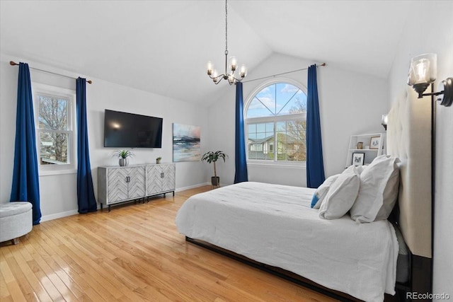 5310 S Flanders Way, Centennial, CO 80015 - bedroom featuring baseboards, wood finished floors, a chandelier, and vaulted ceiling