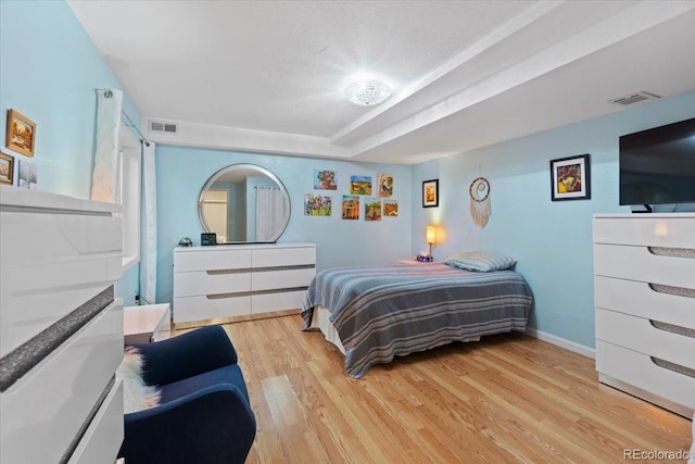 5310 S Flanders Way, Centennial, CO 80015 - bedroom featuring baseboards, visible vents, and light wood finished floors