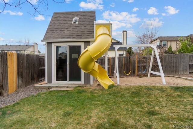 5310 S Flanders Way, Centennial, CO 80015 - view of jungle gym featuring a lawn and a fenced backyard