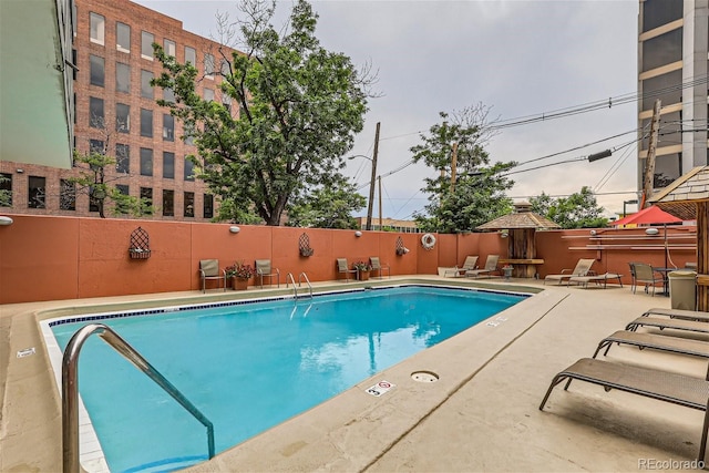 view of pool with a patio area