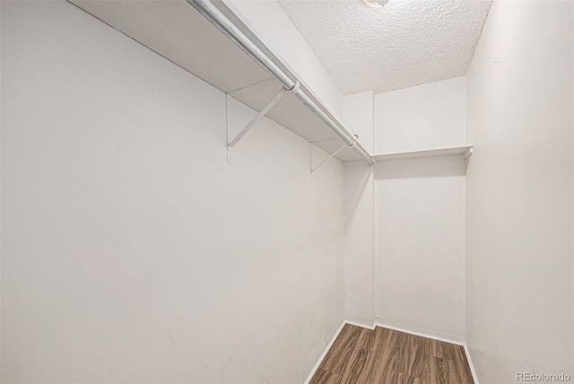 2225 Buchtel Blvd Unit 208, Denver, CO 80210 - spacious closet with wood finished floors