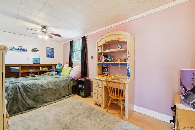 5142 Buffalo Rd, Erie, CO 80516 - bedroom featuring baseboards, crown molding, a ceiling fan, and wood finished floors