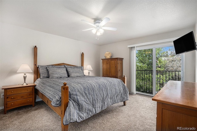 bedroom with a ceiling fan, access to exterior, and light colored carpet