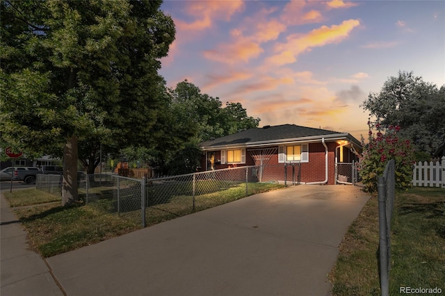 1280 Xanadu St, Aurora, CO 80011 - bungalow featuring driveway and brick siding