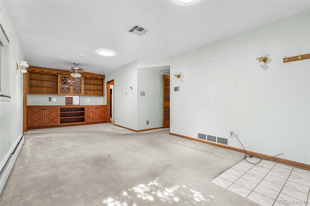 1280 Xanadu St, Aurora, CO 80011 - unfurnished living room with a baseboard heating unit, light carpet, and ceiling fan