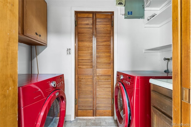 1280 Xanadu St, Aurora, CO 80011 - laundry area featuring cabinet space and independent washer and dryer