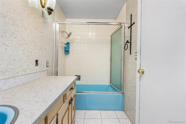 1280 Xanadu St, Aurora, CO 80011 - full bath featuring tile patterned flooring, enclosed tub / shower combo, and vanity