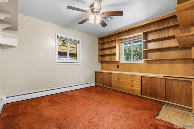 1280 Xanadu St, Aurora, CO 80011 - unfurnished office featuring dark colored carpet, a baseboard radiator, and ceiling fan