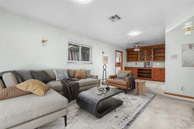 1280 Xanadu St, Aurora, CO 80011 - living room with light carpet and baseboards