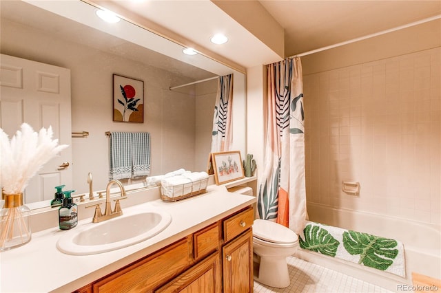 full bathroom featuring vanity, toilet, and shower / bath combo with shower curtain