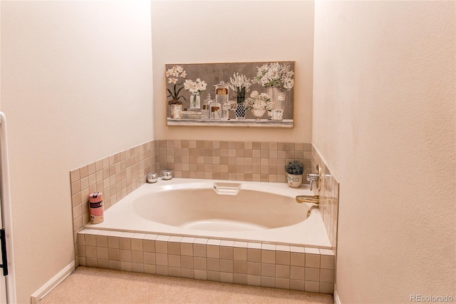 bathroom featuring tiled bath