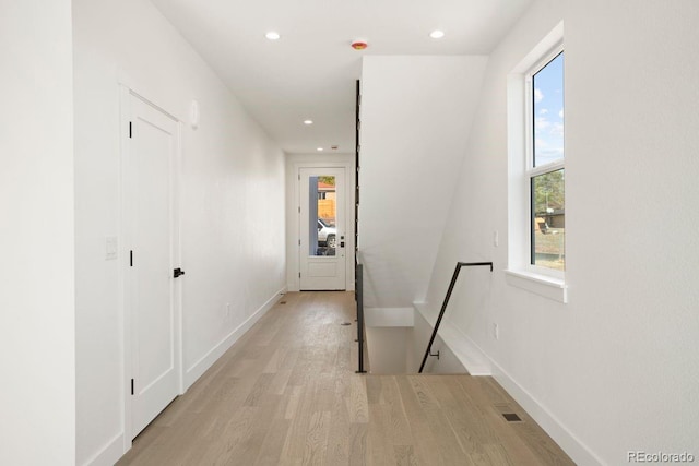 4650 W 9th Ave, Denver, CO 80204 - hall with an upstairs landing, plenty of natural light, light wood-type flooring, and recessed lighting