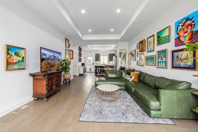 2824 W Parkside Pl, Denver, CO 80221 - living room featuring visible vents, baseboards, recessed lighting, wood finished floors, and a raised ceiling