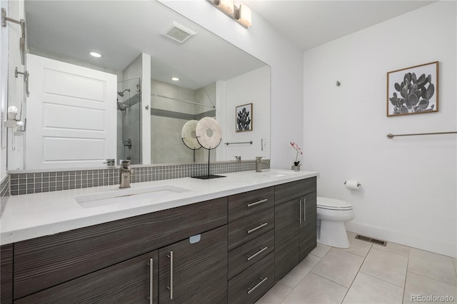 2824 W Parkside Pl, Denver, CO 80221 - bathroom featuring tile patterned floors, a sink, double vanity, a stall shower, and visible vents