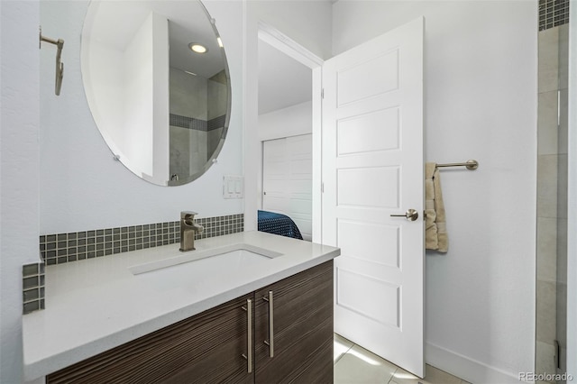 2824 W Parkside Pl, Denver, CO 80221 - bathroom featuring vanity and decorative backsplash