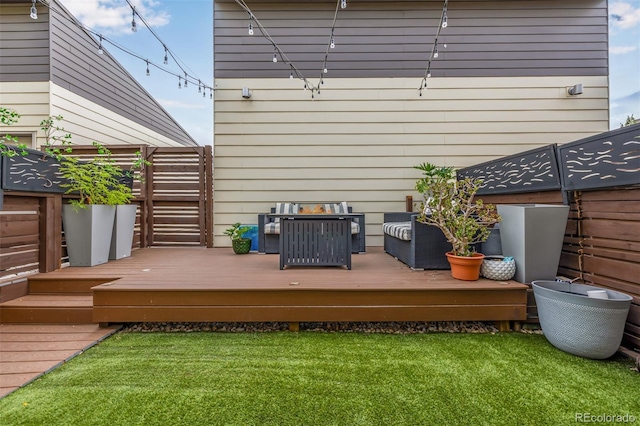 2824 W Parkside Pl, Denver, CO 80221 - wooden deck with a lawn and fence