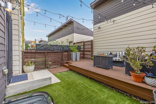 2824 W Parkside Pl, Denver, CO 80221 - view of yard featuring a wooden deck and a fenced backyard