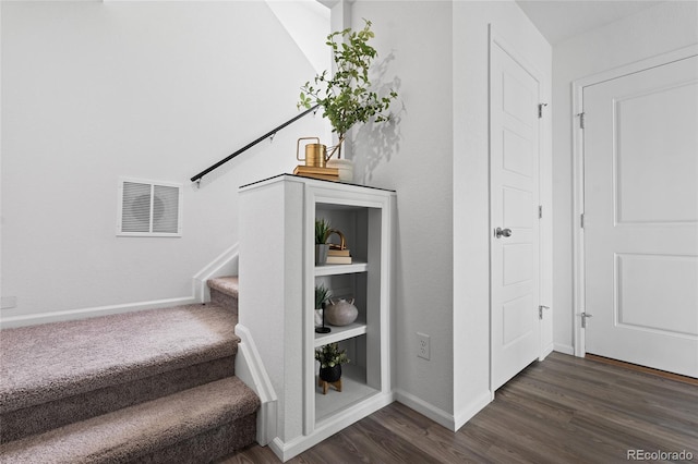 18645 E 54th Pl, Denver, CO 80249 - stairs with wood finished floors and baseboards