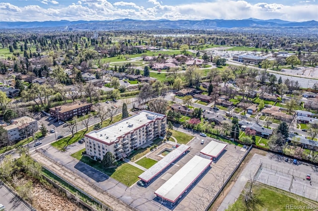 7801 W 35th Ave Unit 406, Wheat Ridge, CO 80033 - drone / aerial view featuring a mountain view
