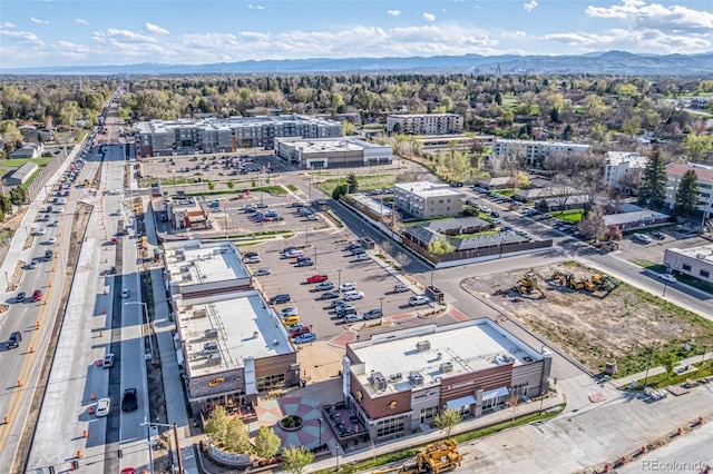 7801 W 35th Ave Unit 406, Wheat Ridge, CO 80033 - birds eye view of property featuring a mountain view
