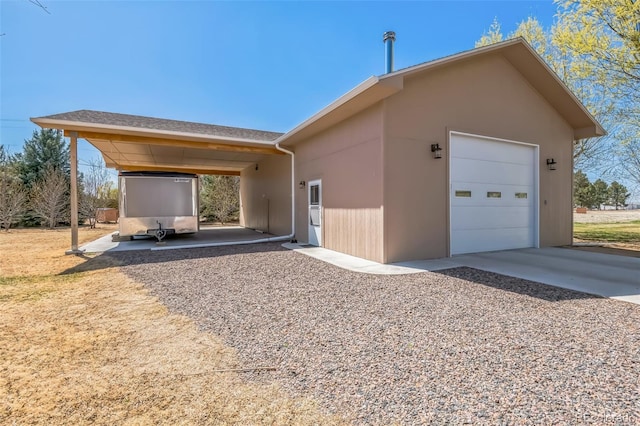 view of property exterior featuring driveway and stucco siding