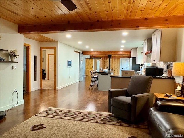 9081 Range Ln, Salida, CO 81201 - living area featuring beam ceiling, dark wood-style flooring, and recessed lighting
