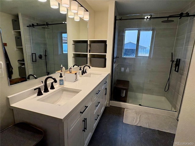 9081 Range Ln, Salida, CO 81201 - bathroom featuring healthy amount of natural light, a shower stall, double vanity, and tile patterned floors