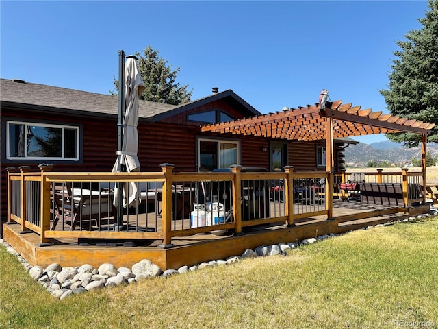 9081 Range Ln, Salida, CO 81201 - rear view of property with a deck with mountain view, a yard, log veneer siding, and a pergola