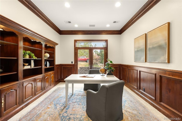 home office featuring french doors, visible vents, a wainscoted wall, and ornamental molding