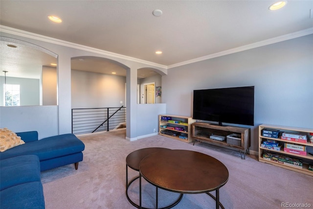 living room with crown molding and carpet flooring