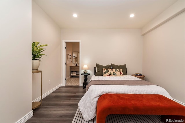 bedroom featuring dark hardwood / wood-style floors