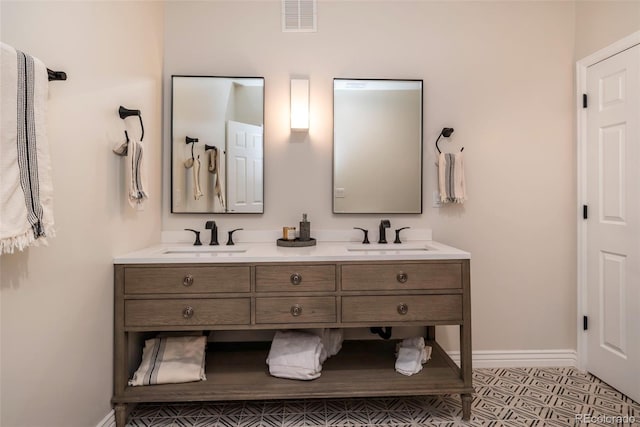 bathroom featuring vanity and tile patterned floors