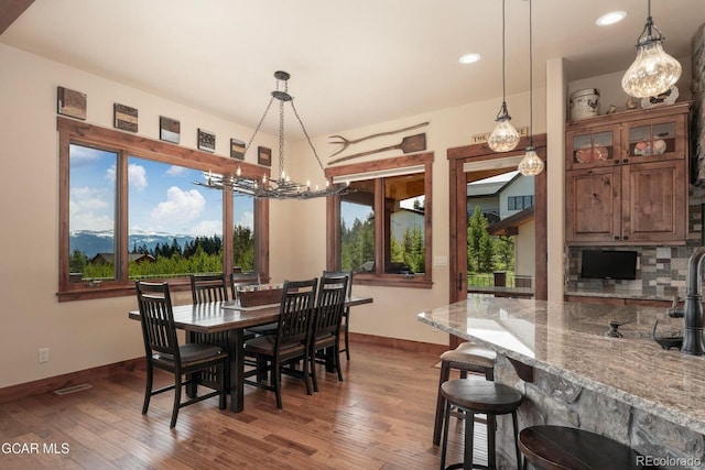 2621 Gcr 519, Tabernash, CO 80478 - dining space with a chandelier, dark wood-type flooring, and recessed lighting