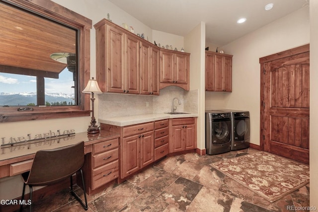 2621 Gcr 519, Tabernash, CO 80478 - laundry room featuring cabinet space, independent washer and dryer, dark stone finish floors, recessed lighting, and a desk